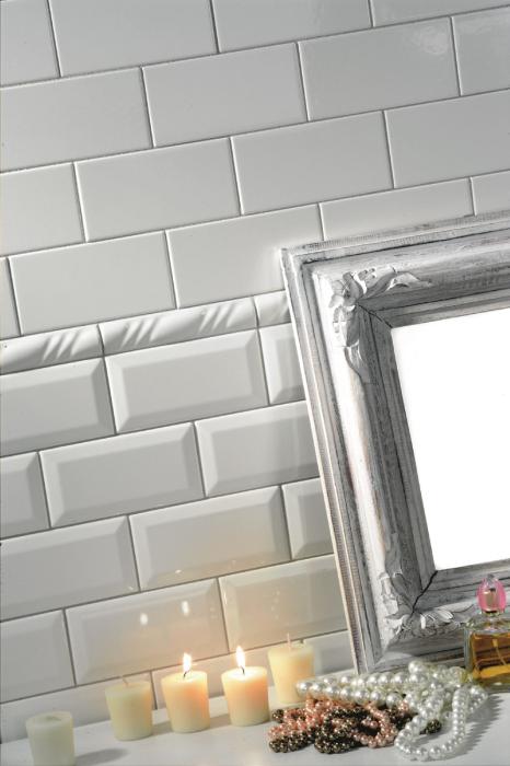 Biselado 10x30 vit fasad